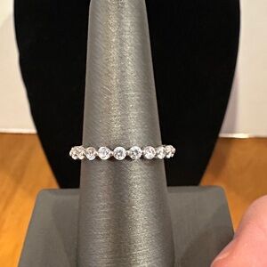 Eternity 925 Silver and White Crystal Band. Size 8. EUC no missing stones.